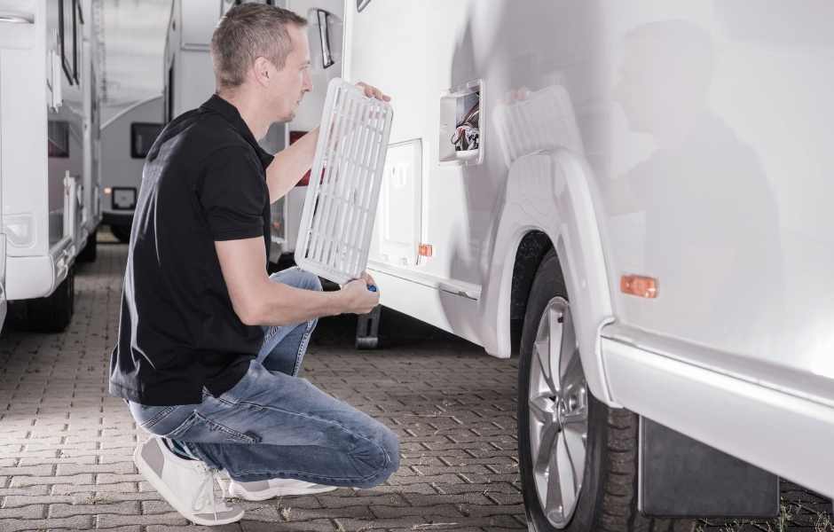 Man repairing RV electrical system