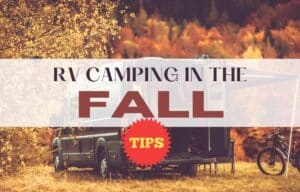 image of an RV camping amongst the changing colors of trees in the fall