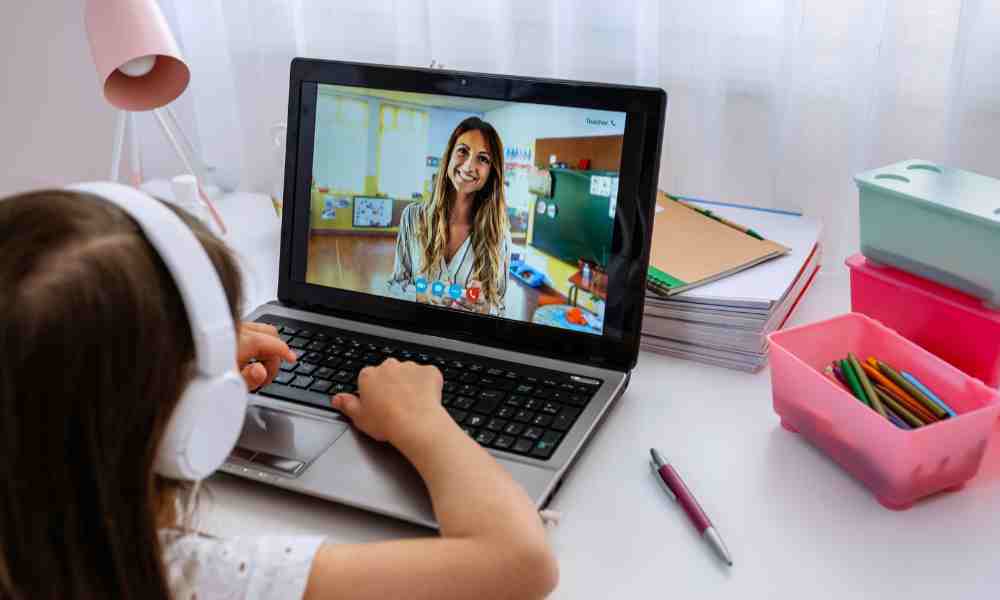 Girl on laptop for online school