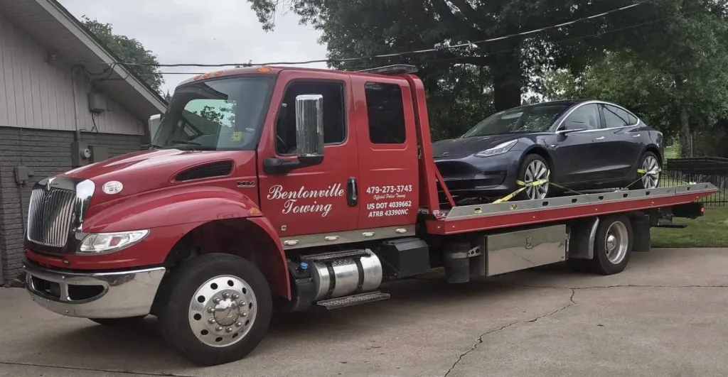 Tesla on Flatbed Truck