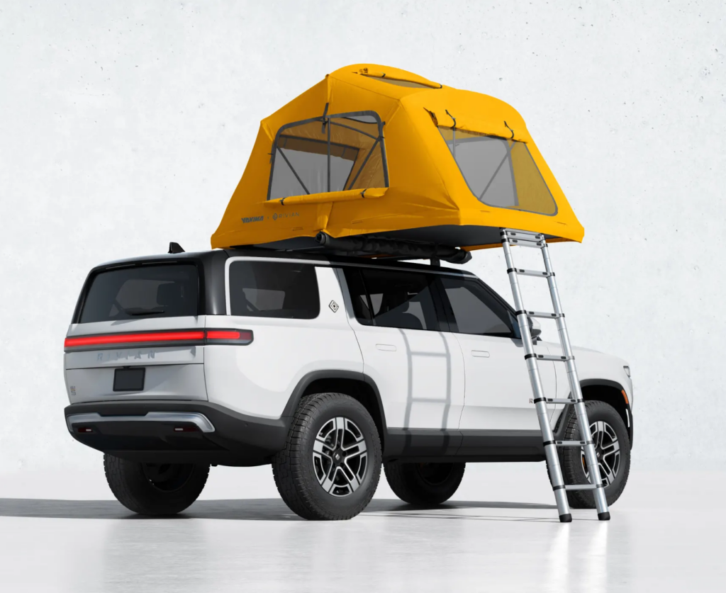 Rivian RS1 with tent on roof